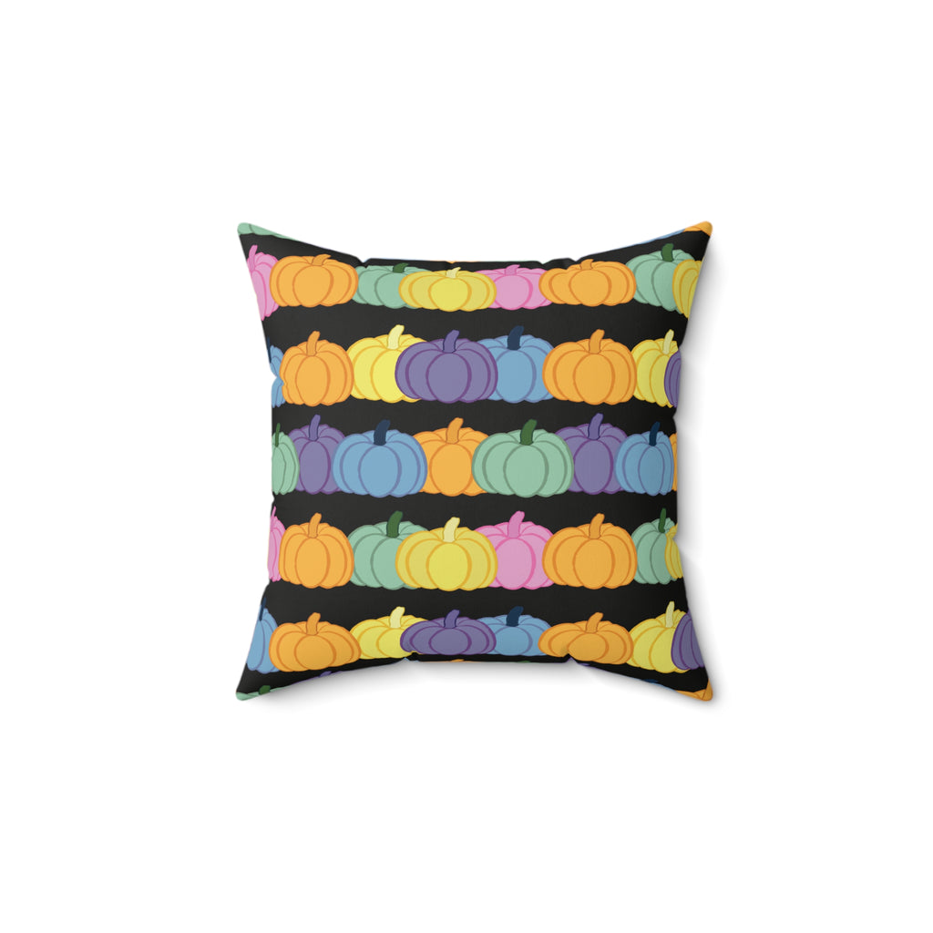 Black throw pillow with pastel pumpkins in orange, purple, green, yellow,  blue and pink